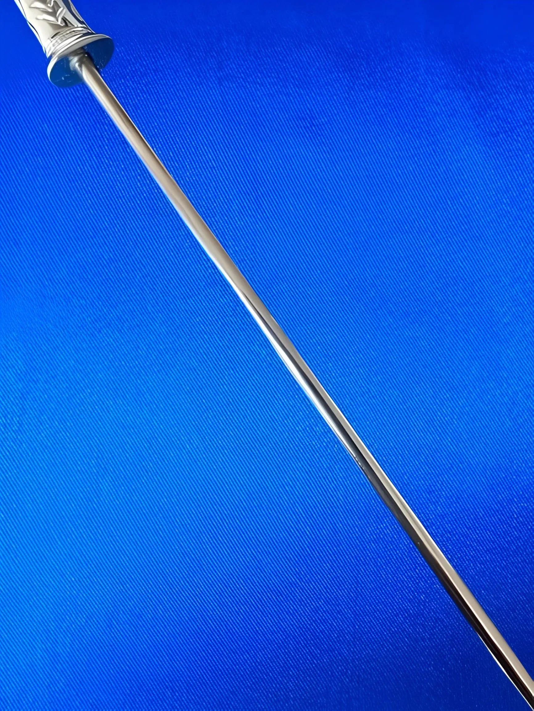 Close-Up of Engraved Sikh Baaj Tool – Durable Turban Styling Accessory